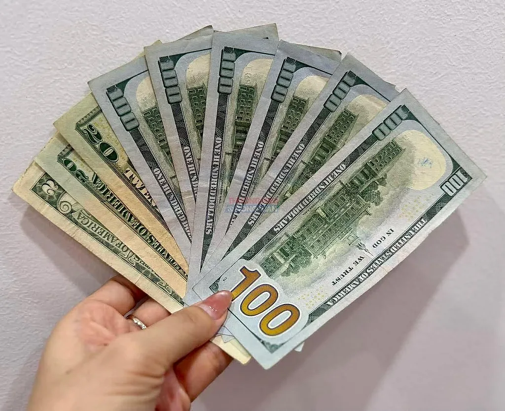 Tỷ giá USD hôm nay 23/9: Tỷ giá trung tâm tăng, đồng bạc xanh giằng co quanh vùng cao