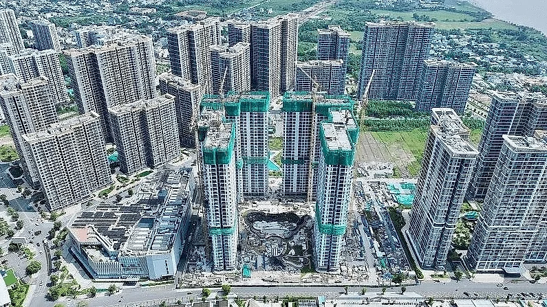 Hạ giá đất, giá nhà có giảm theo?
